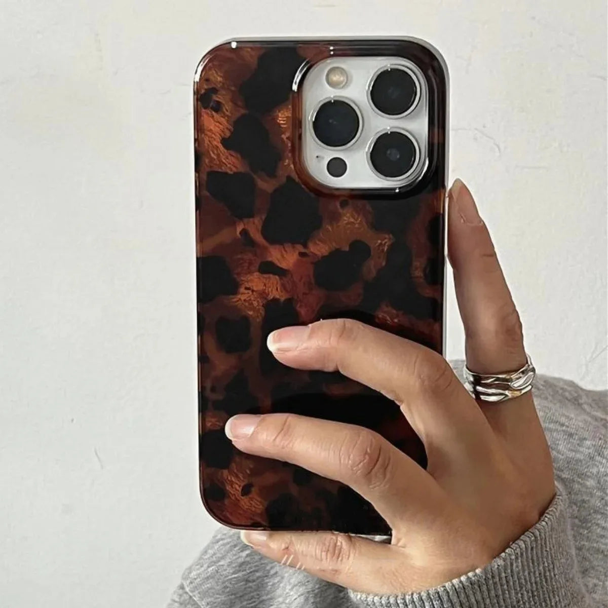Retro Amber Leopard Print iPhone Case Laser Texture Shockproof Soft Cover