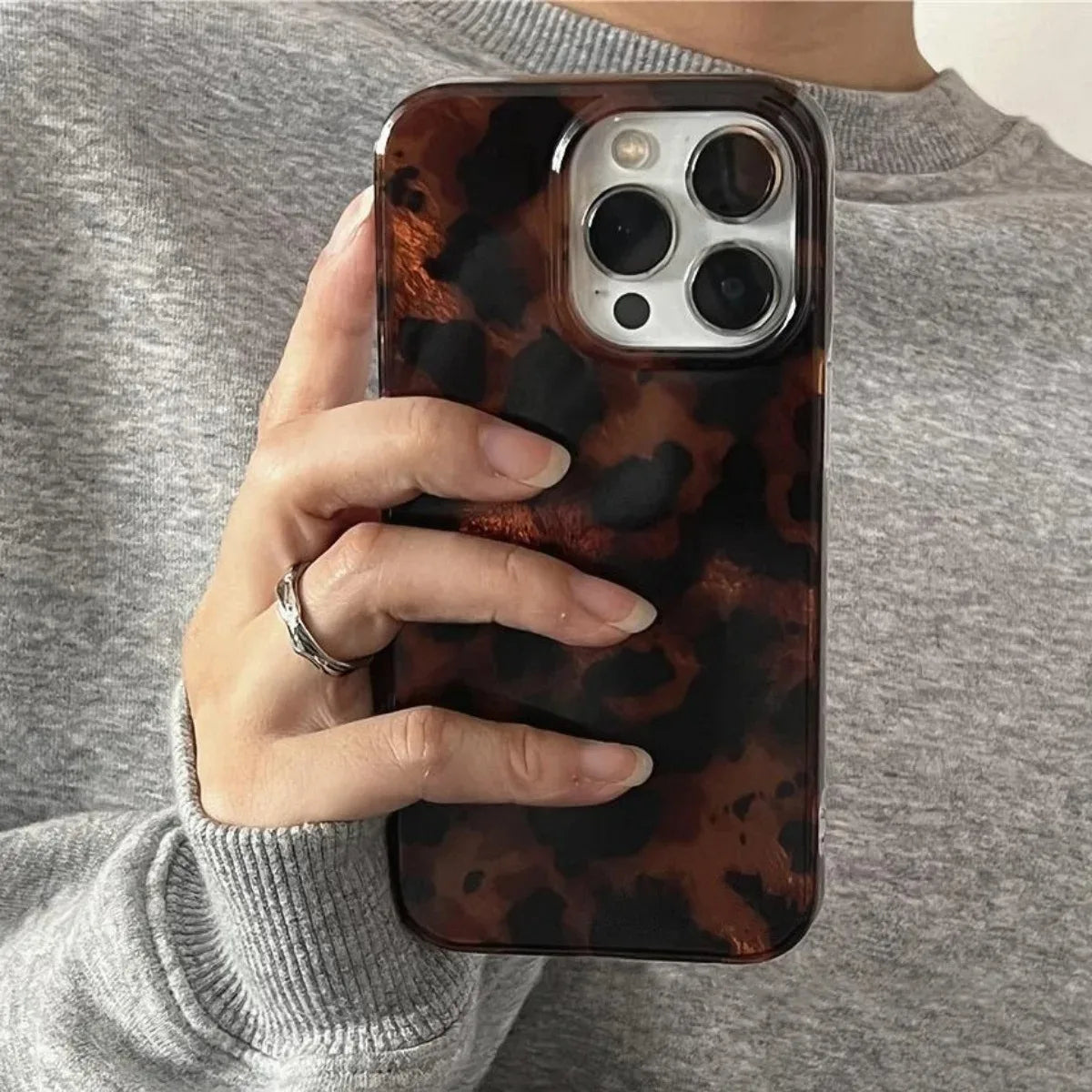 Retro Amber Leopard Print iPhone Case Laser Texture Shockproof Soft Cover