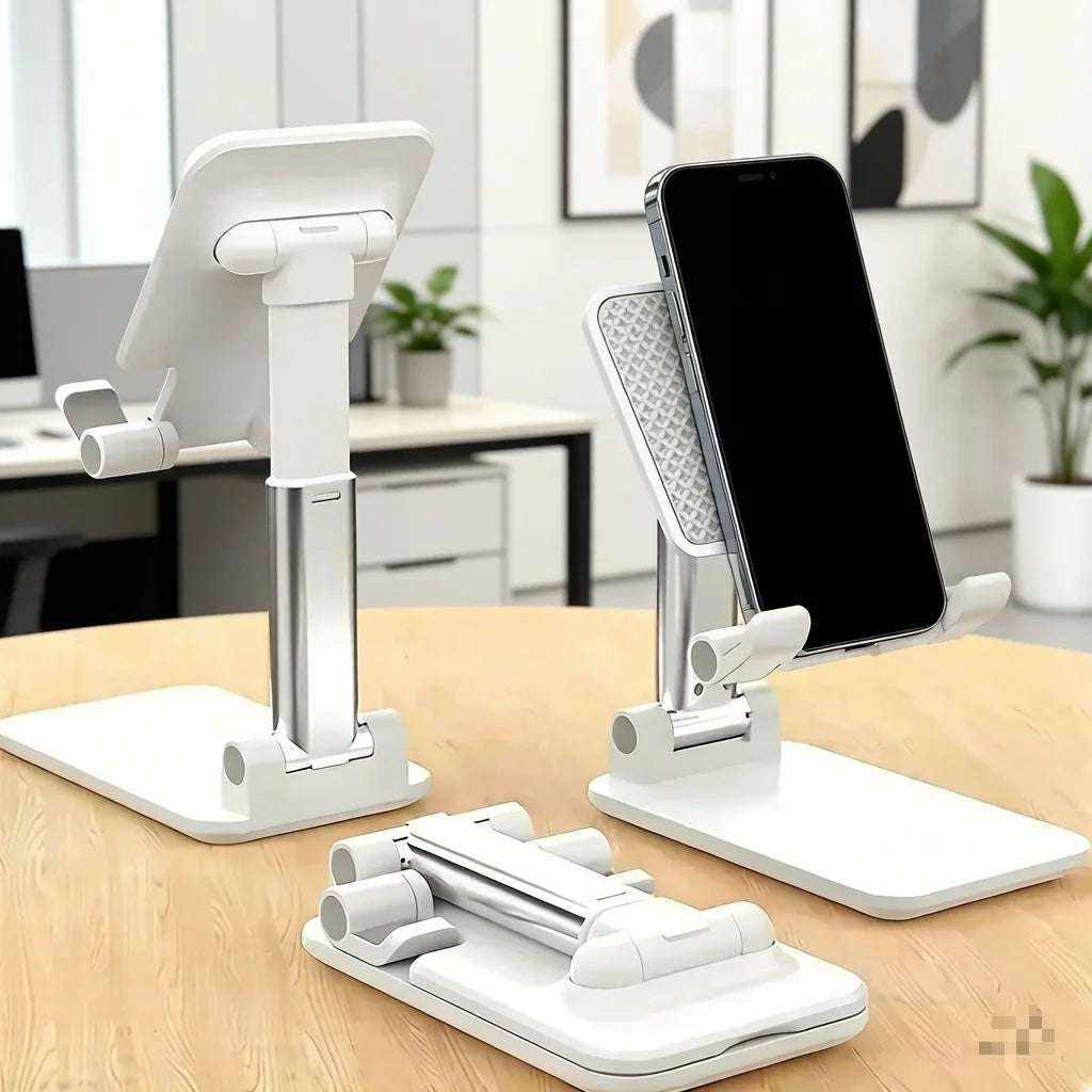 Adjustable Desk Phone Holder in white plastic with silver telescoping supports, folding hinges, and a textured phone rest